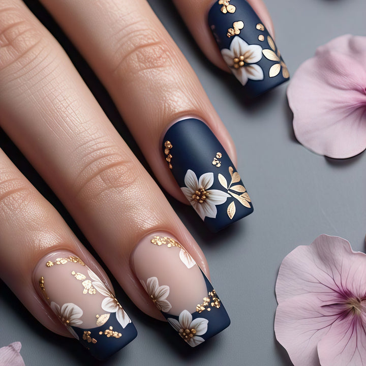 Artificial nails with floral accents and glamour effects Stornfield