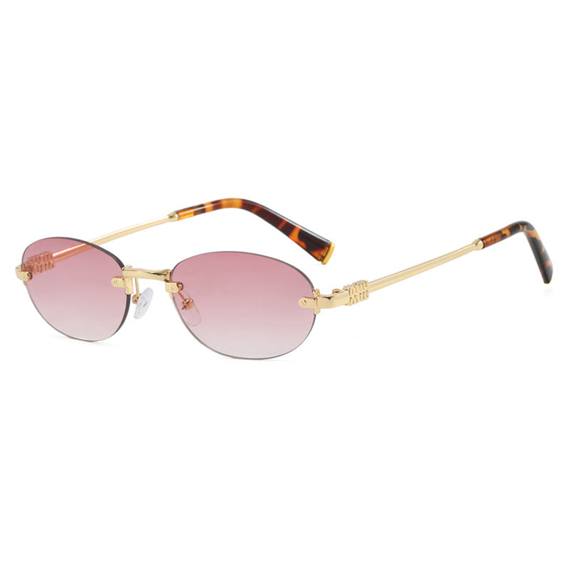 Women's fashion sunglasses with oval frame and elegant accents Stornfield