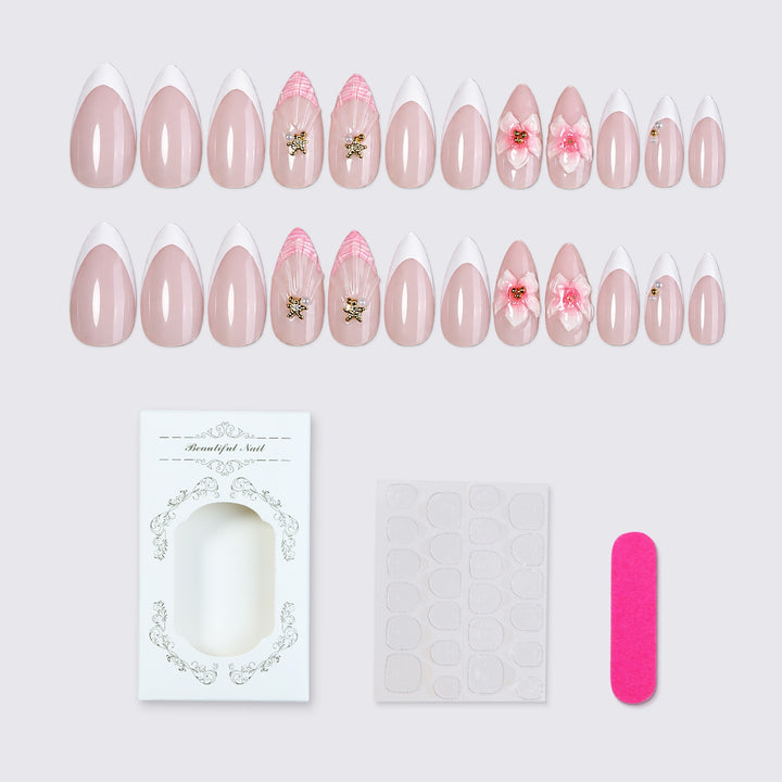 Artificial nail set with delicate flower and glitter applications Stornfield