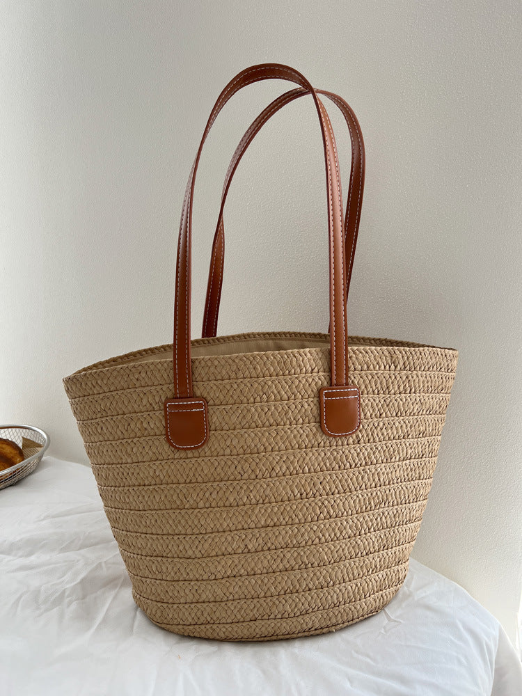 Handcrafted straw bag with elegant leather handles Stornfield