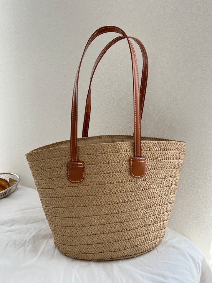 Handcrafted straw bag with elegant leather handles Stornfield