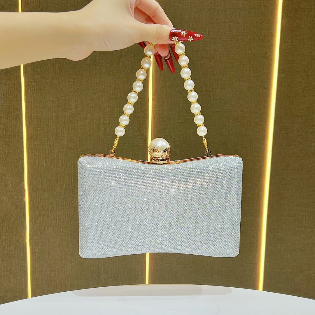 rhinestone-embellished evening clutch