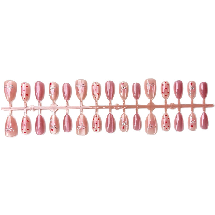 Nail art set with romantic hearts and elegant bows Stornfield