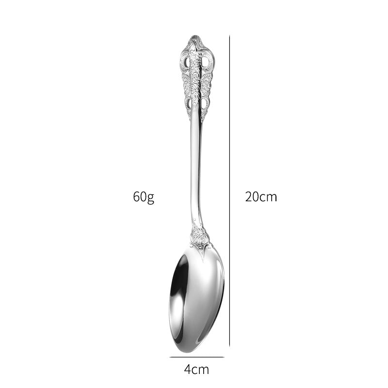 Elegant fish fork with artistic handle design Stornfield