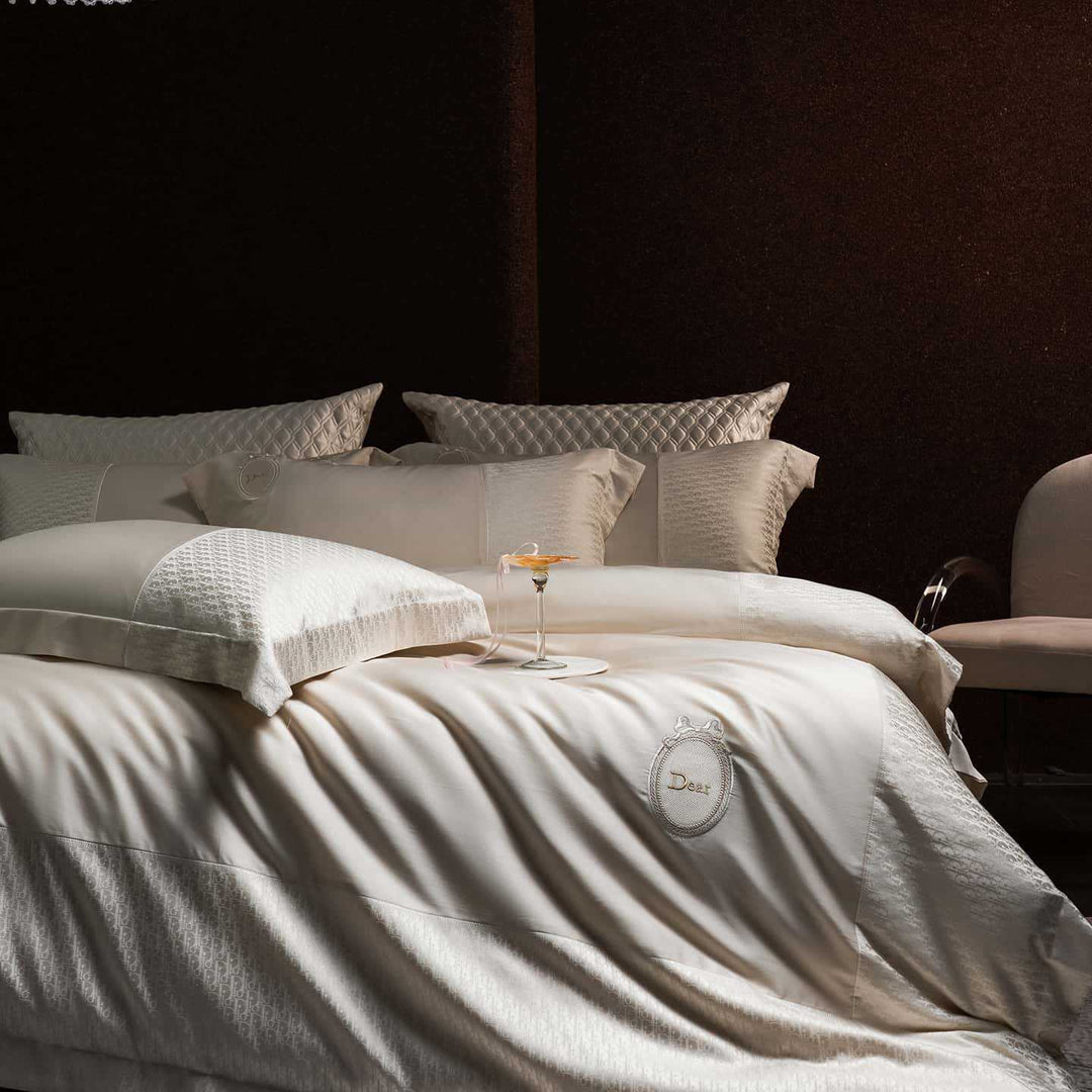 Luxurious satin bedding set with jacquard trim and embroidered coat of arms