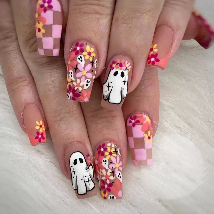 Artificial nail set with playful 3D designs and blooming patterns Stornfield