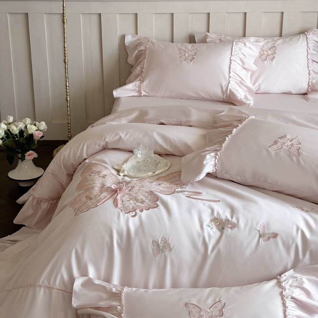 Romantic ruffled bedding set with butterfly embroidery and quilted comforter