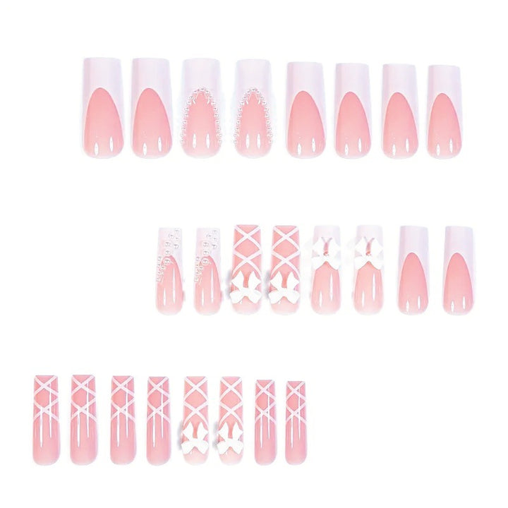 Artificial nail set with elegant 3D bows and pearl embellishments Stornfield