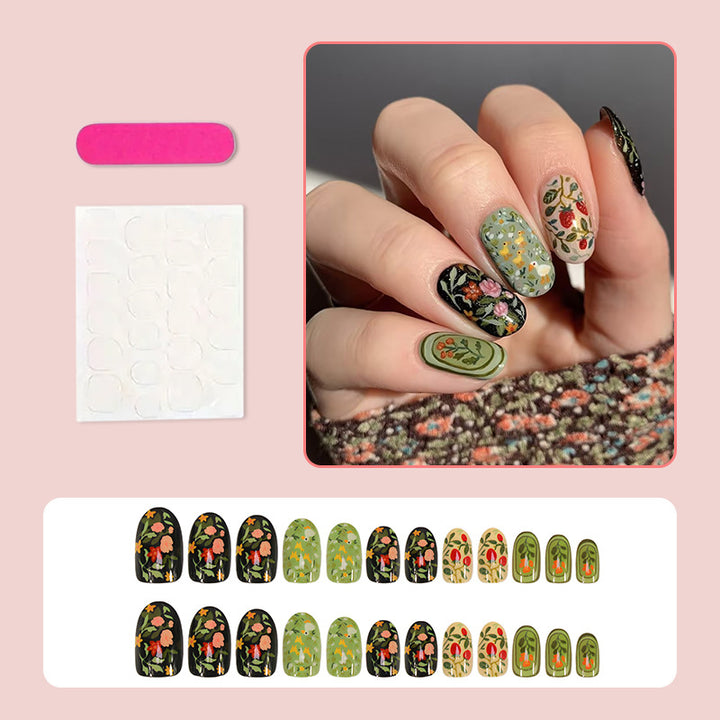 Artificial nail set with floral motifs and glitter accents Stornfield