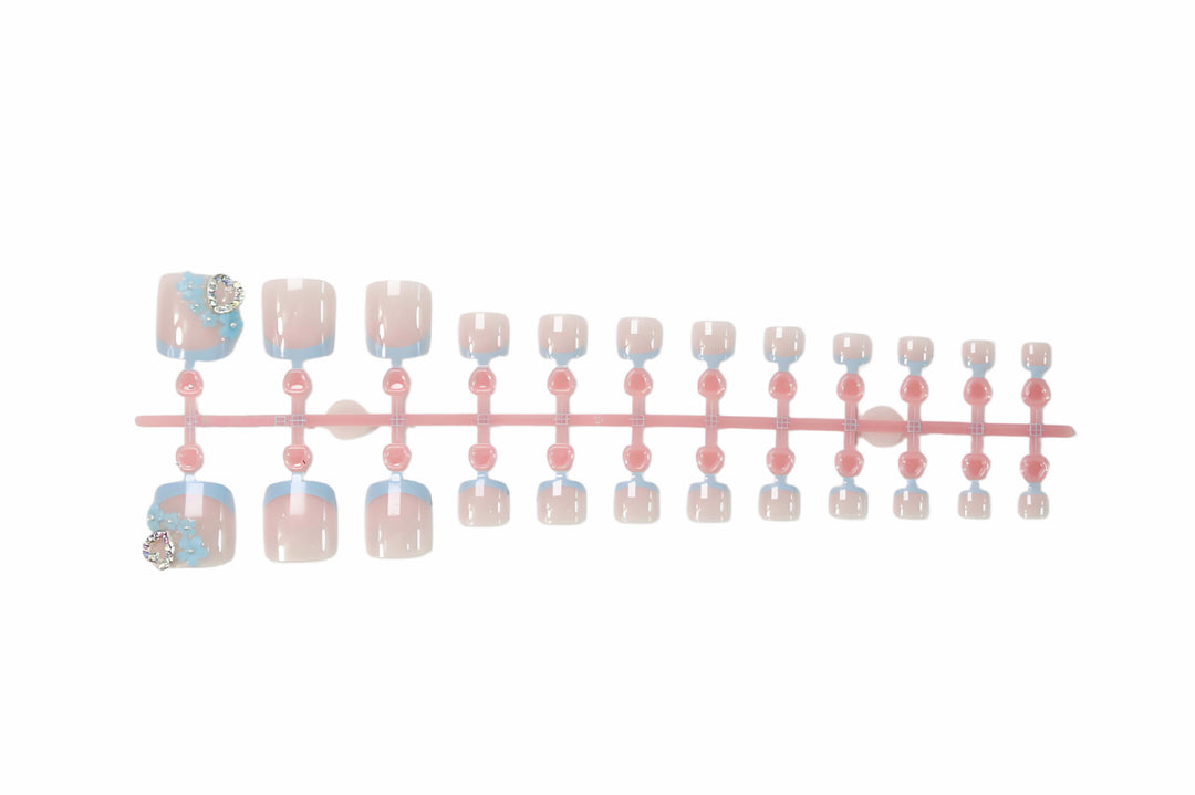 Nail art set with elegant flower and glitter accents Stornfield