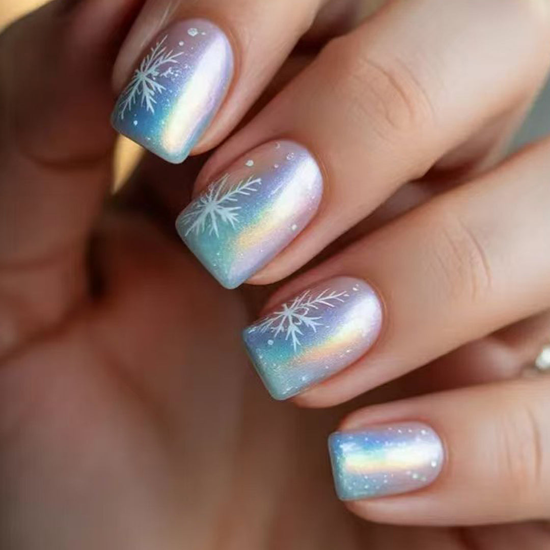 Wintry Artistic Nails with Shimmering Snowflake Design Stornfield