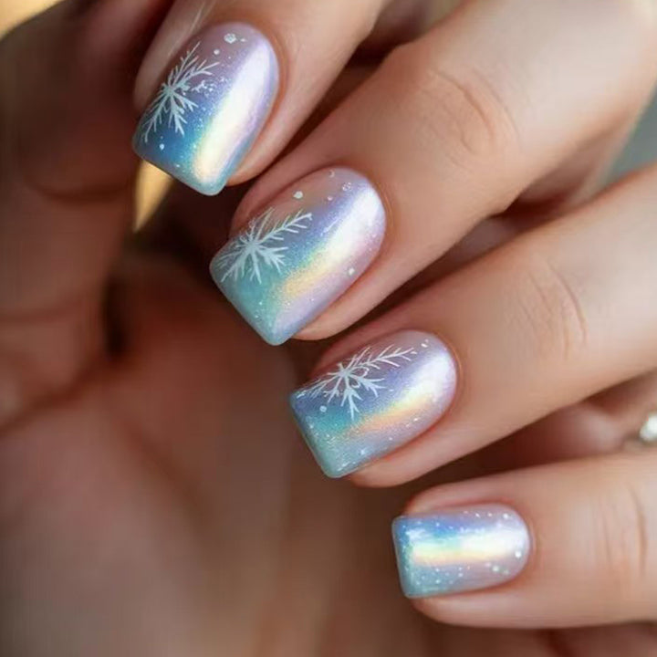 Wintry Artistic Nails with Shimmering Snowflake Design Stornfield