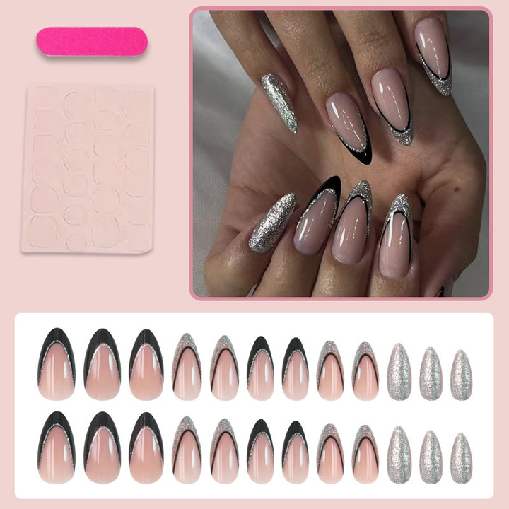 Artificial nail set with glamorous glitter accents and elegant black Stornfield