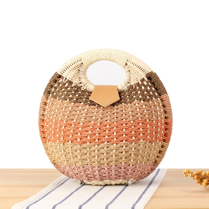 Round straw bag with elegant leather handle Stornfield