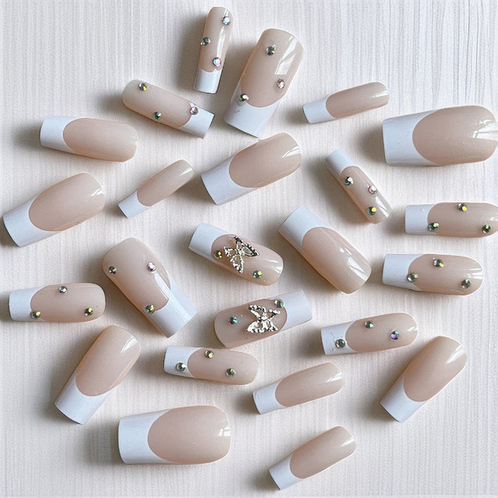 Elegant Stiletto Nail Extensions with Rhinestone Accents Stornfield