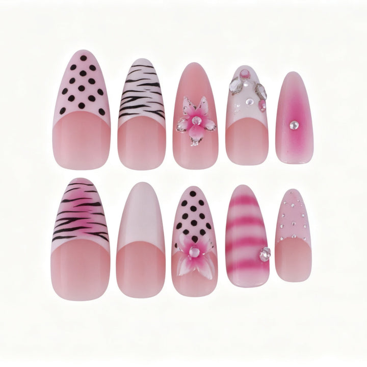 Artistic Press-On Nail Design with Unique Patterns and Rhinestone Accents Stornfield