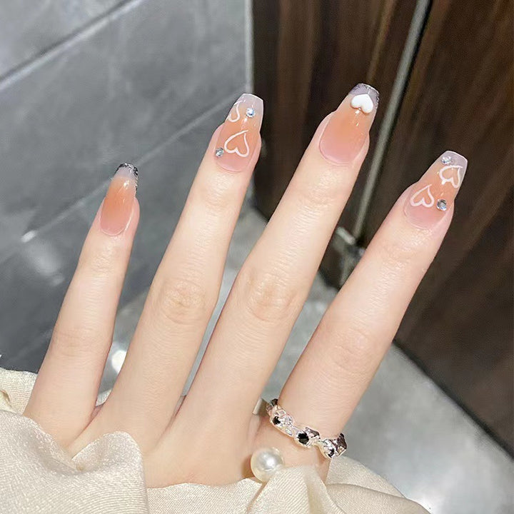 Artful nail tips in heart design Stornfield