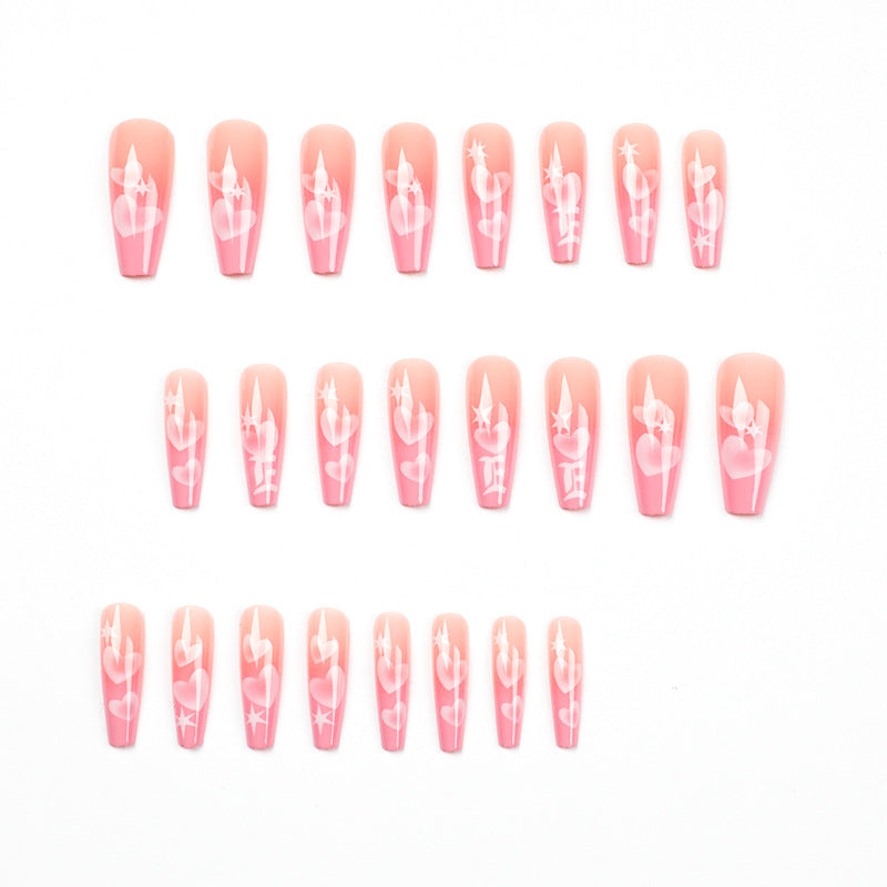 Artificial nail art with heart patterns Stornfield