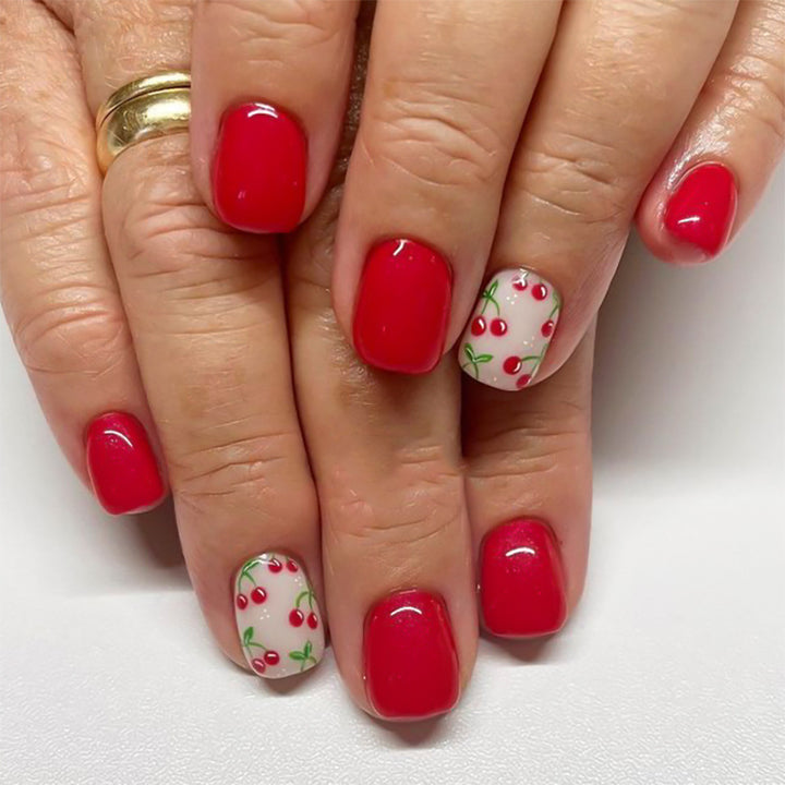 Creative nail art with fruity cherry design Stornfield