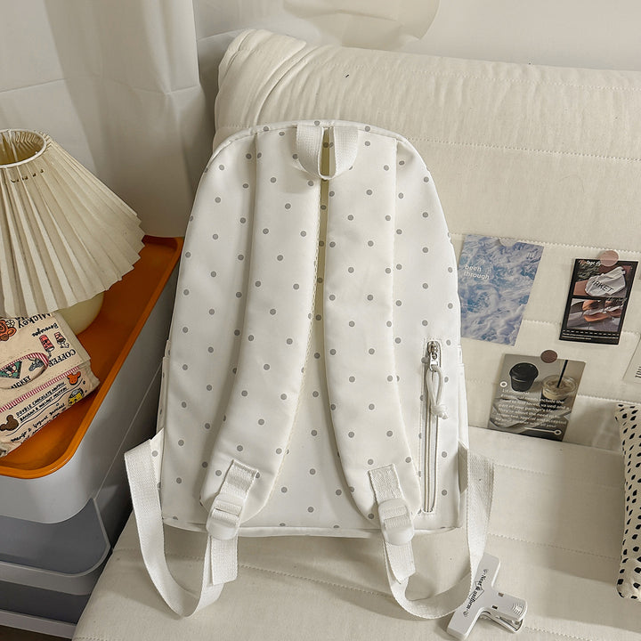 Polka Dot Patterned Backpack with Playful Wing Accents Stornfield