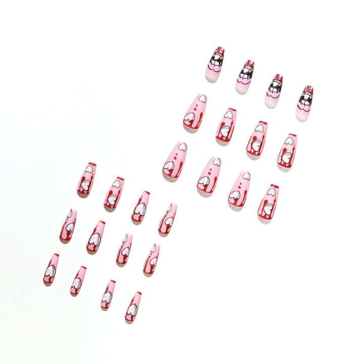 Artificial nail art with heart-shaped design and matte finish Stornfield
