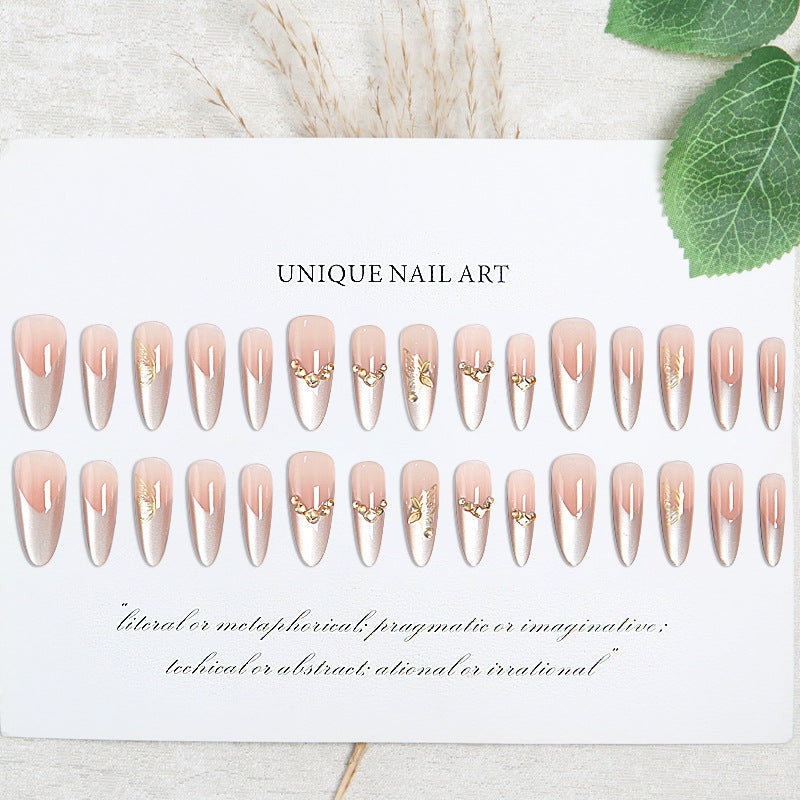 Glamorous art nails with elegant golden details Stornfield