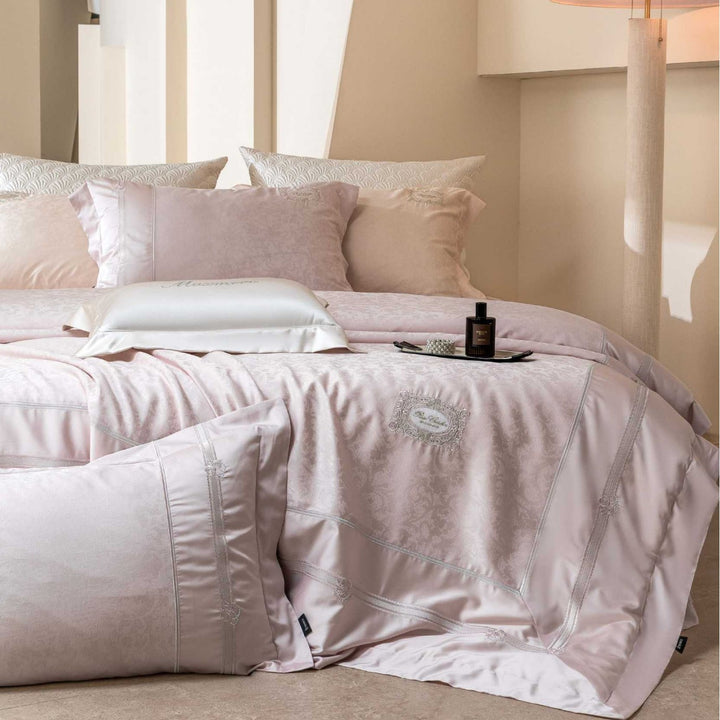 Luxurious cotton satin bedding set with damask jacquard, satin edge and embroidered medallion