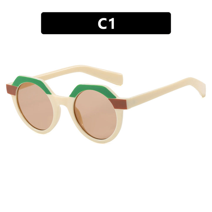 Ladies extravagant round sunglasses with colored accented frame Stornfield