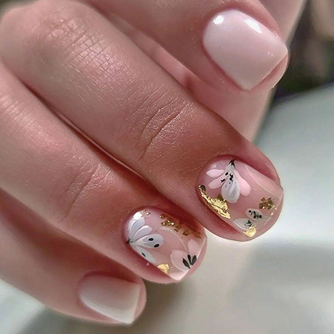 Elegant Artificial Nail Design with Floral Accents Stornfield
