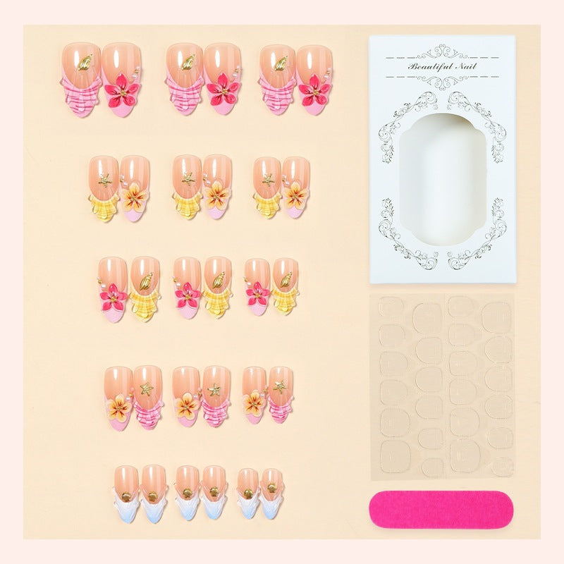 Artificial nail set with floral patterns and sparkling accents Stornfield