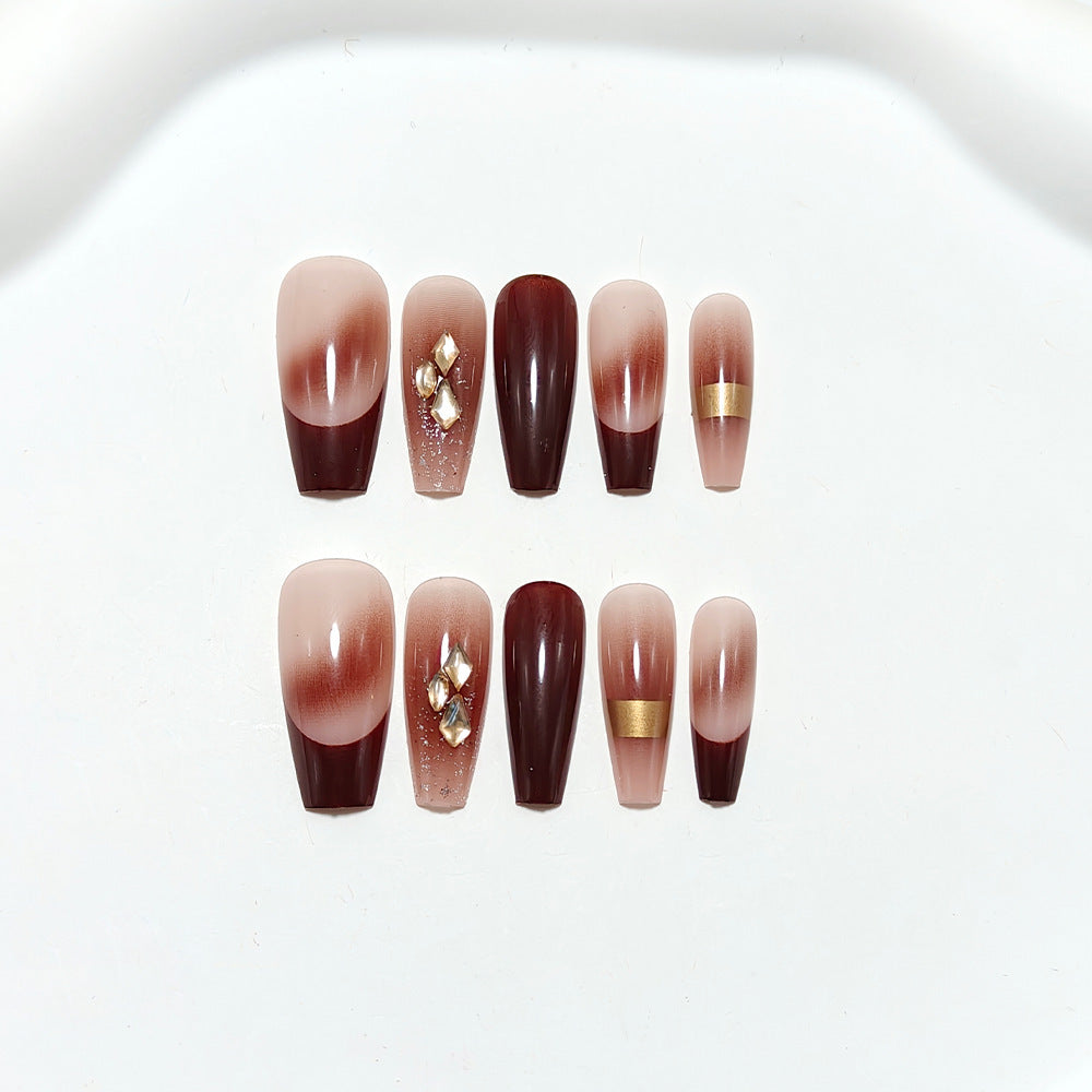 Luxurious artificial nails with glamorous decorations Stornfield