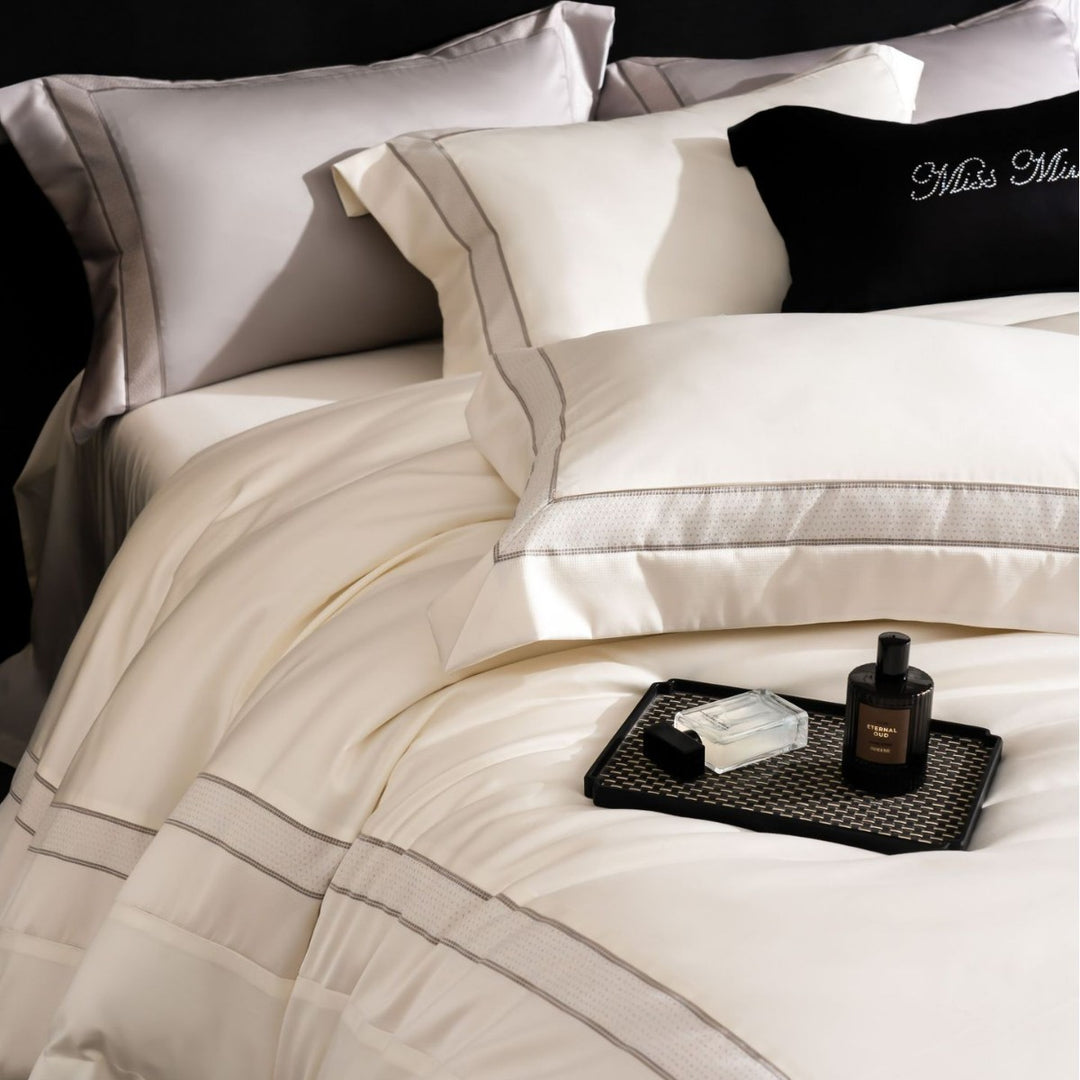 Luxurious cotton bedding set with quilted blanket and fine pillowcases