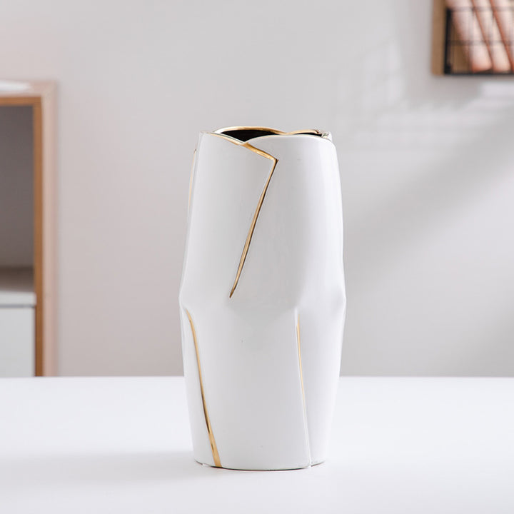 Decorative ceramic vase with golden accents Stornfield