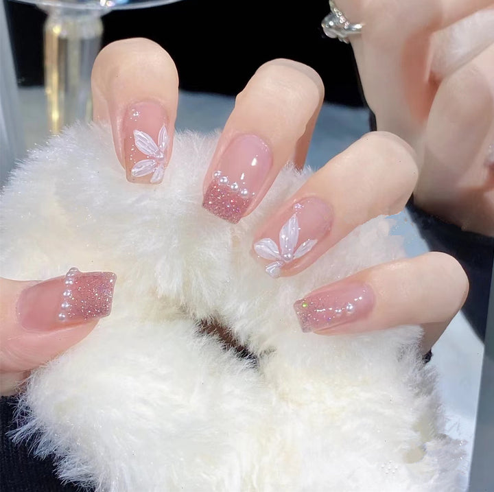 Glamorous artificial nails with sparkling accents Stornfield