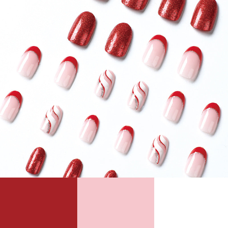 Artful Nail Extensions with Glitter and Wave Pattern Stornfield