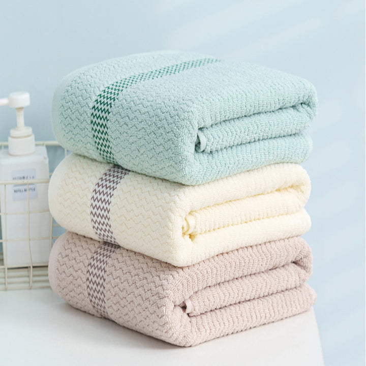 High-quality terry towel with dense pile and decorative zigzag border