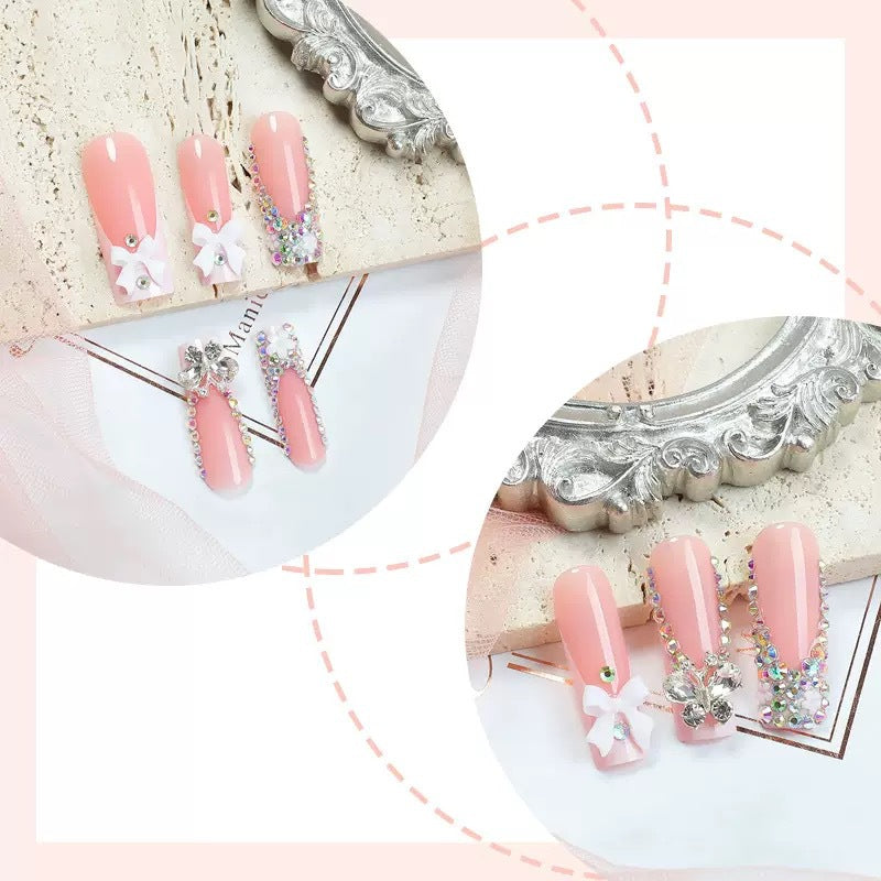 Artificial nail set with shimmering rhinestone decorations and floral design Stornfield