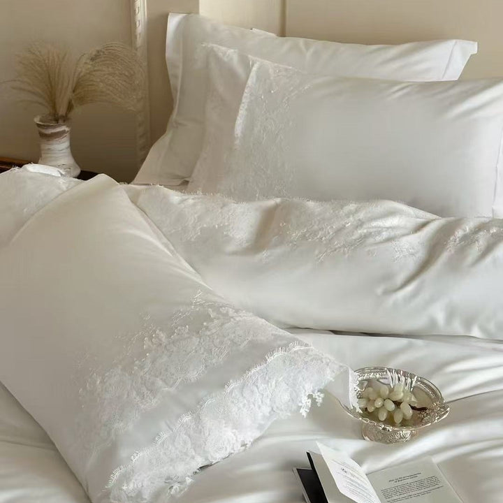 Shiny satin bedding set with fine lace application and floral relief embroidery