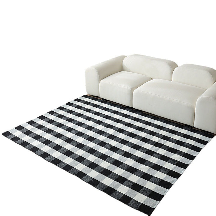 Woven living area rug with large check pattern and flat cotton texture Stornfield