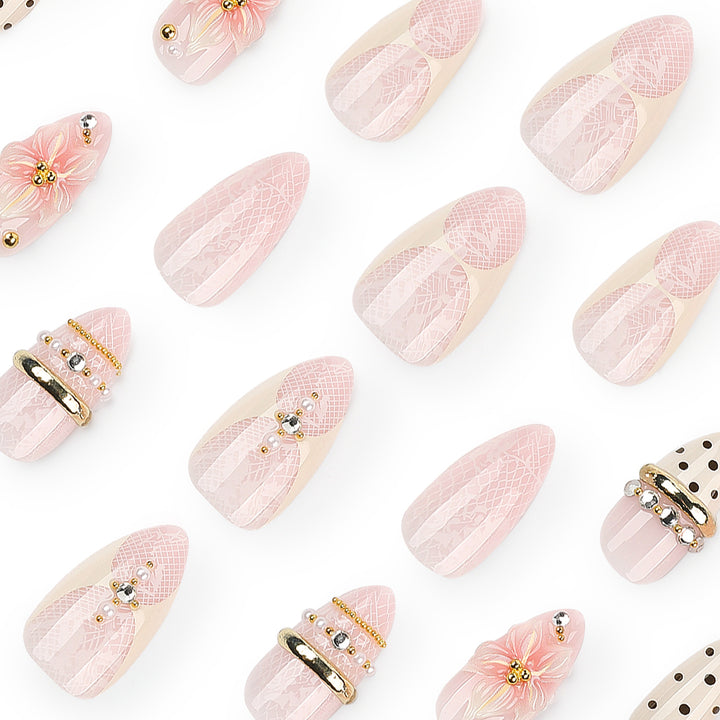 Artful Nail Extensions with Elegant Floral and Glitter Accents Stornfield