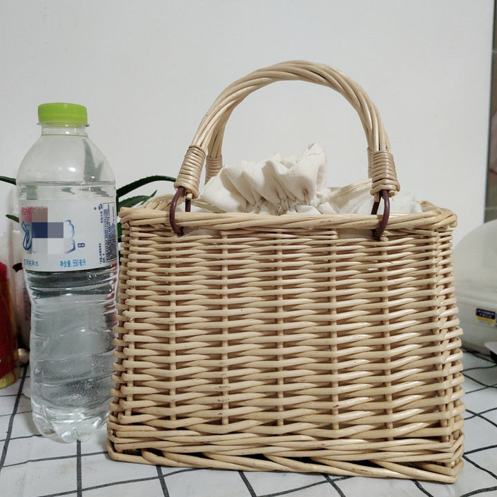 Women's handbag made of braided material with cotton drawstring closure Stornfield