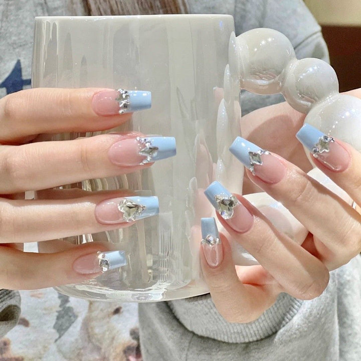 Elegant Rhinestone-Embellished Nail Art Stornfield