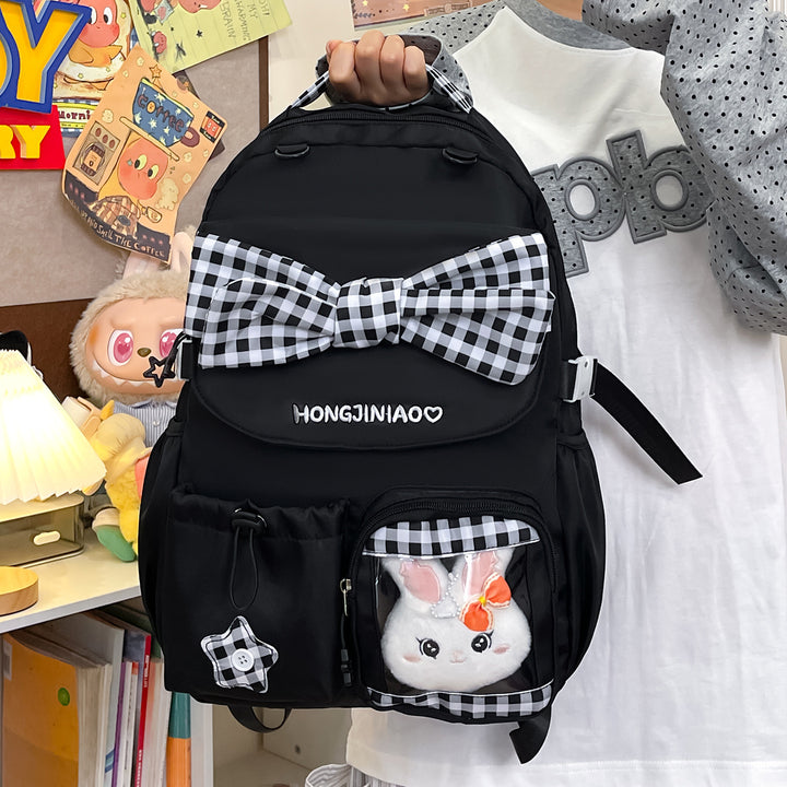 Playful Bow-Embellished Backpack Stornfield