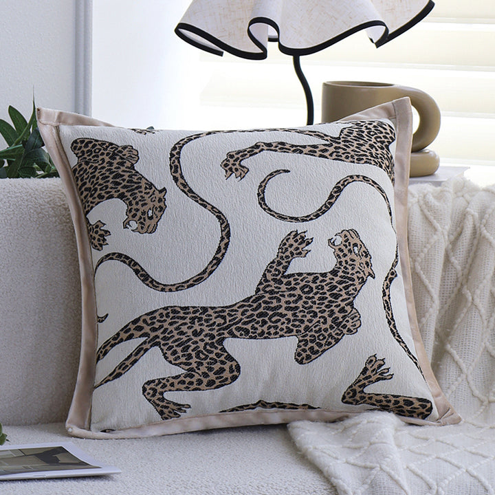 Square decorative cushion cover made of mottled bouclé weave with subtle piping Stornfield