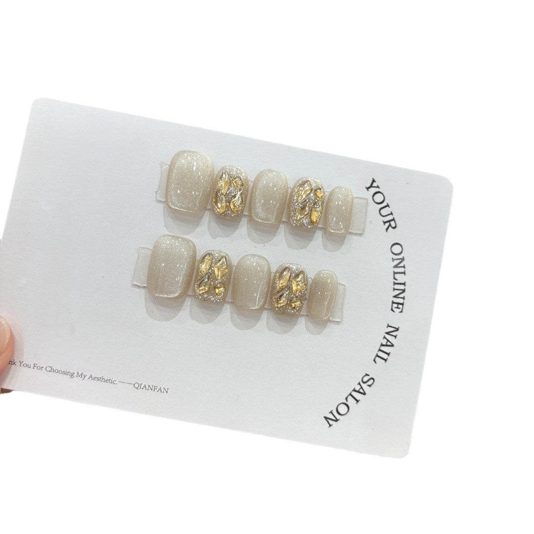 Artifical nail tips with glitter and rhinestones Stornfield