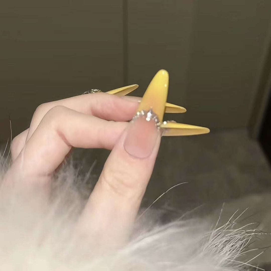 Stiletto Nail Extensions with Decorative Accents