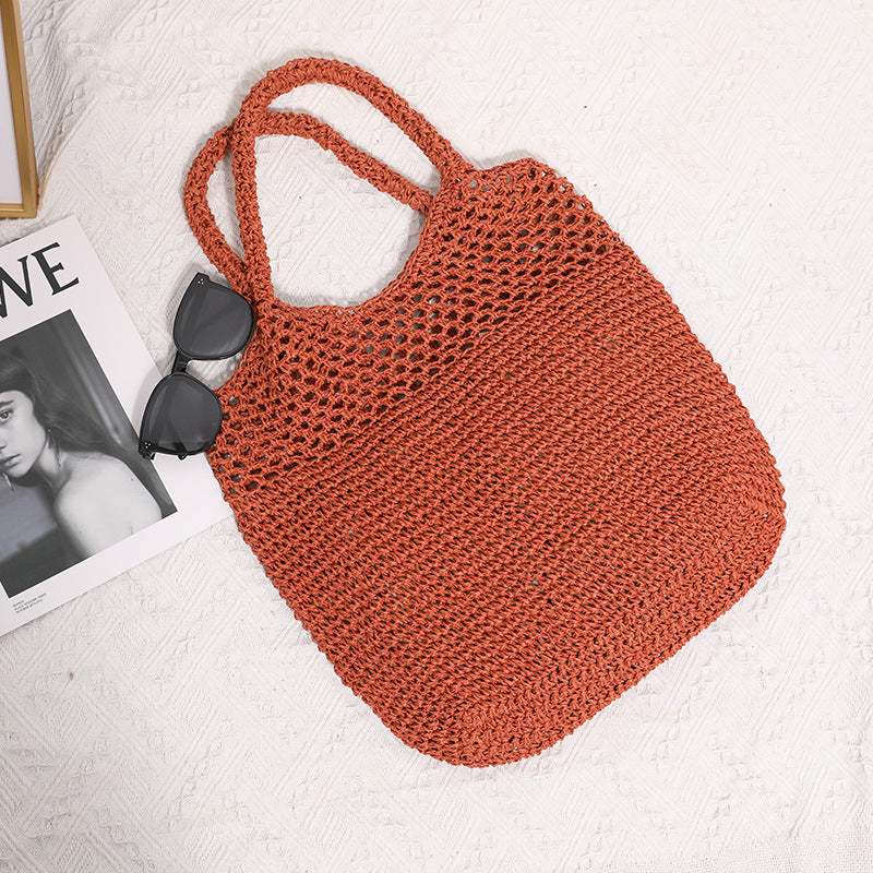 Handcrafted straw bag with wide carrying handle Stornfield