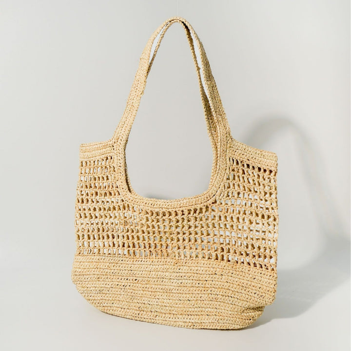 Hand-knotted raffia bag with generous interior Stornfield