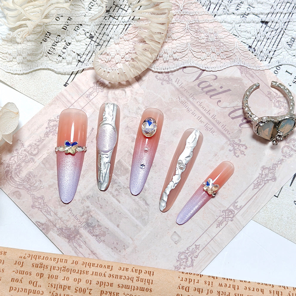 Artificial nails with elegant ombre design and jewelry accents Stornfield
