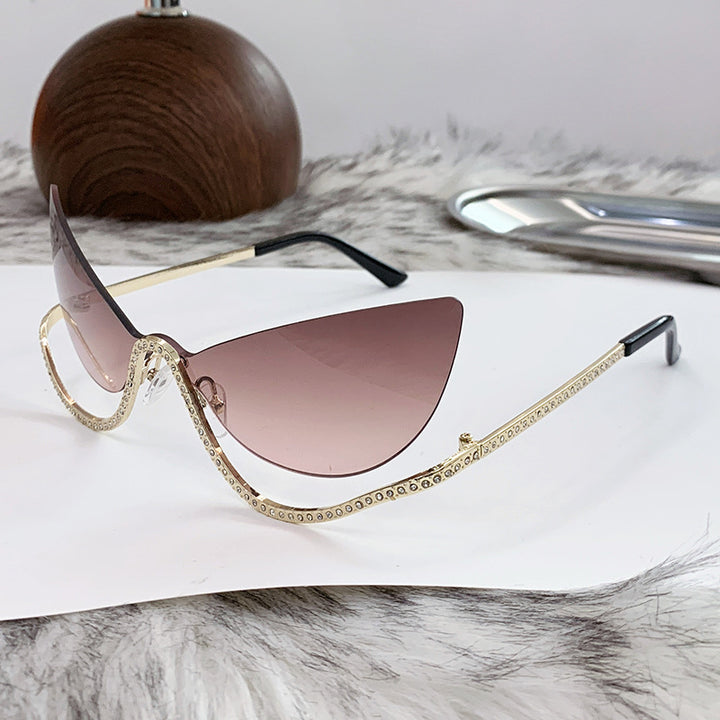 Women's extravagantly shaped Cat-Eye sunglasses with sparkling appliqués Stornfield